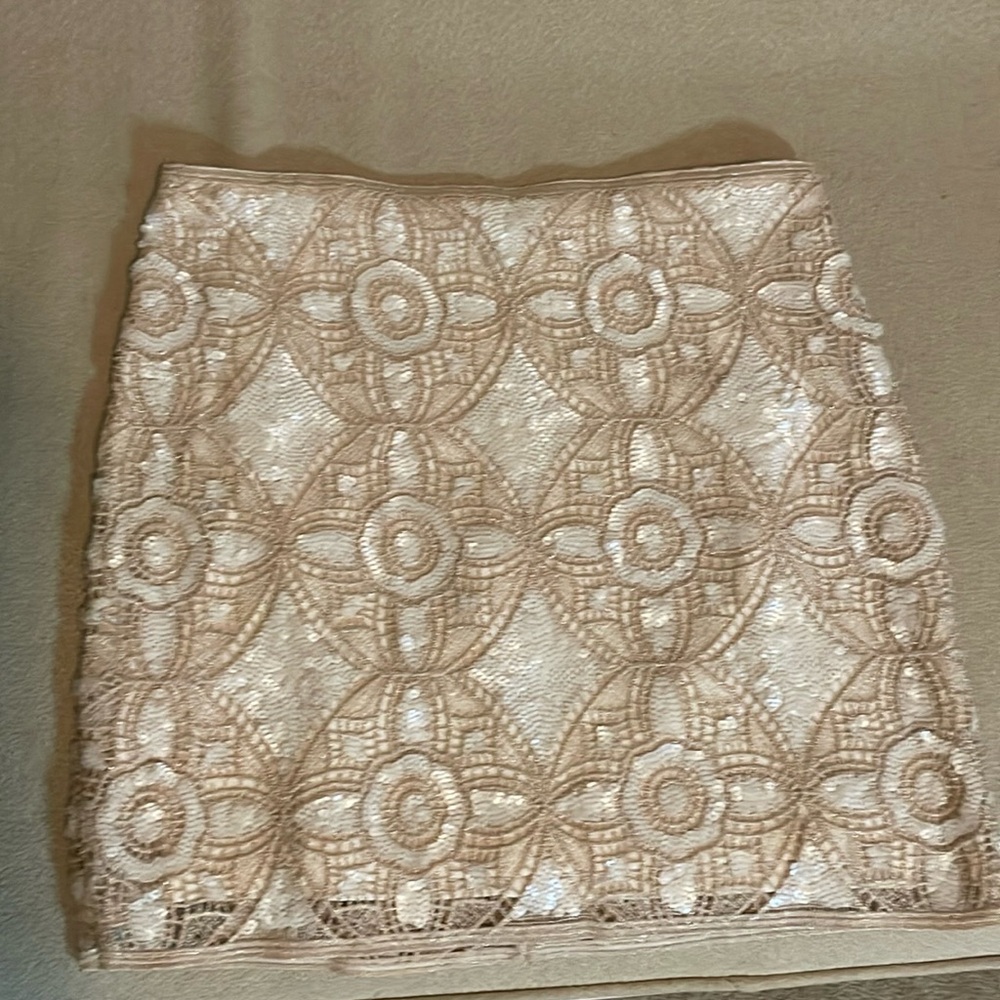 Express sequin mini skirt. Size 8, ivory and pale pink.